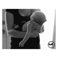 2015 Black & White Newborn Favorite Motherhood Adored holding baby details