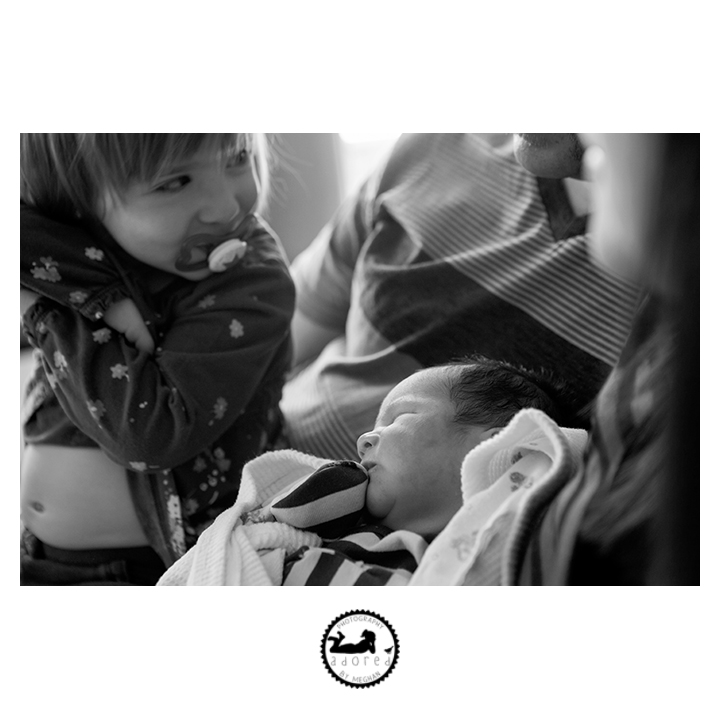 Big Sister meeting her baby brother for the first time a the hospital after he's born.