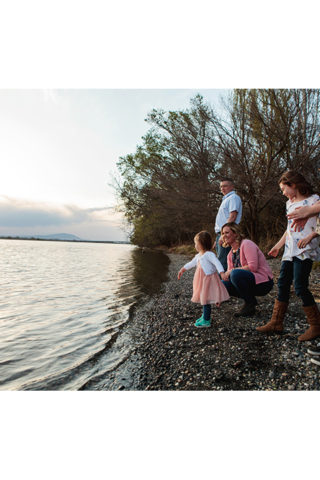 Throwing rocks in the Columbia River at Chiawana Park in Pasco, WA. Portraits by Adored by Meghan, Tri-Cities, WA.