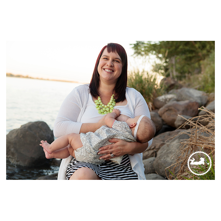 Happy Momma breastfeeding her baby girl during a nursing portrait session with Adored by Meghan Kennewick WA