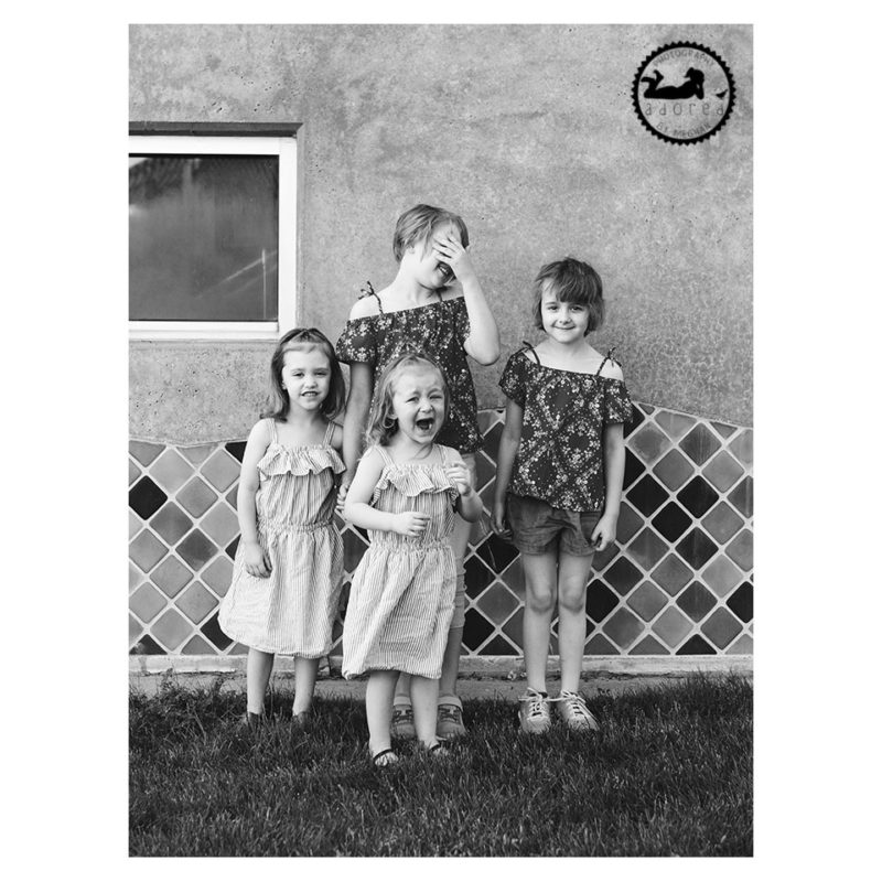 Four girls with a sad crying sister black and white portrait by Adored by Meghan Tri-Cities, WA