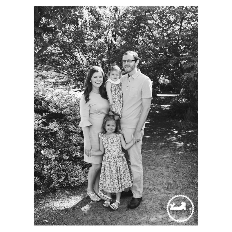 Black and White family portrait in the garden during mini-session with Adored by Meghan