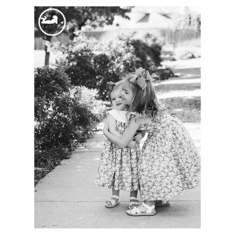 Black and White portrait of Sisters in the garden during mini-session with Adored by Meghan