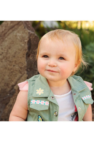 Baby girl in the garden photographed by Adored by Meghan Richland, WA